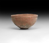 Bronze Age Decorated Bowl
16th-14th century BC. A broad terracotta bowl with narrow discoid base, chamfered rim, band of impressed-point detailing be...