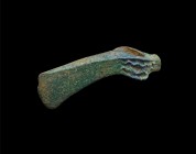 Bronze Age Large Axehead with Zig-Zag Pattern
2nd millennium BC. A substantial bronze with rounded socket bearing running zigzag detailing, hammer fa...