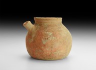 Large Bronze Age Brush-Decorated 'Teapot'
16th-14th century BC. A squat terracotta vessel with broad base, rounded body, low rim with collar, short s...