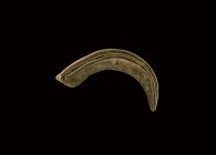 Bronze Age Scythe Blade
2nd-1st millennium BC. A bronze scythe blade with curving blade, flat ridge with rib running along the edge, short tang at th...