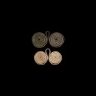 Bronze Age Spectacle Pendant Group
2nd millennium BC. A pair of bronze pendants formed as two coils of round-section rod with a loop terminal. 41 gra...