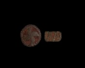 Iron Age Celtic Artefact Group
1st century BC-1st century AD. A mixed bronze group comprising: a discoid belt slider with reserved swastika on a red ...