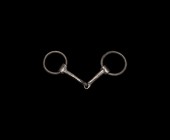 Iron Age Celtic Snaffle Bit
2nd century BC-2nd century AD. An iron snaffle bit comprising two hinged arms with curved tubular finials and two lozenge...