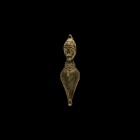 Romano-Celtic Figural Strap Fitting
1st century BC-1st century AD. A bronze fitting in the form of a male wearing a spotted conical hat, a torc or ro...