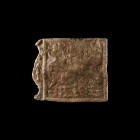 Danubian Horse Rider Cult Plaque
3rd-4th century AD. A lead-alloy square plaque with low-relief arch above, ropework square border, sun in chariot ab...