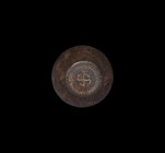 Viking Trade Weight with Swastika
9th-11th century AD. A bronze barrel-shaped weight with iron core; both flat faces engraved with swastika motif wit...