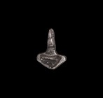 Viking Silver Hammer Pendant
9th-11th century AD. A silver pendant with pierced suspension lug, short shank, broad trapezoidal head with recess. 6.14...