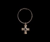Viking Gilt Silver Cross Pendant
11th-12th century AD. A silver amuletic pendant comprising an equal-arm cross with ribs to the end of each arm, cent...