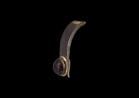 Germanic Silver Bracelet Fragment with Garnet
4th-5th century AD. A silver bracelet fragment with applied cell, beaded collar, inset large garnet cab...