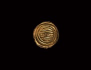 Anglo-Saxon Gilt Button Brooch with Face
6th century AD. A gilt-bronze button brooch of Class Iii with stylised face of concentric rings and a billet...