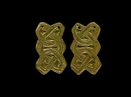 Viking Interlaced Plate Brooch Pair
9th-12th century AD. A matched pair of bronze plate brooches, each a plaque with beaded band formed into an inter...