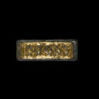 Anglo-Saxon Chip Carved Scabbard Mount
6th-7th century AD. A gilt-bronze mount comprising a raised border enclosing a procession of Style II animal s...
