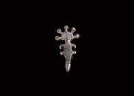 Miniature Migration Period Silver Radiate-Headed Bow Brooch
7th-8th century AD. A miniature silver radiate-headed bow brooch with D-shaped headplate ...