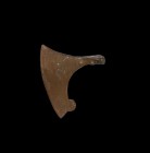 Viking Broad Axe-Head Pendant
10th-12th century AD. A bronze pendant in the form of a gracefully curved axe-head with a long slicing blade and discoi...