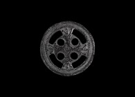 Germanic Bifacial Roundel with Stamped Design
5th-6th century AD. A bronze openwork roundel with concentric rings of stamped annulets, central ring-a...