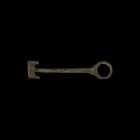 Viking Latch Key
9th-11th century AD. A bronze latch lifter key with large loop, rectangular-section shank, the bit formed as a rectangular plate wit...