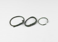 Viking Bracelet Collection
9th-11th century AD. A group of three bronze bracelets comprising: one D-section with clubbed terminals, punched decoratio...