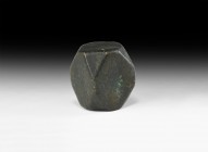 Large Viking Polyhedral Trade Weight
9th-11th century AD. A very large bronze weight of polyhedral form, punched dots to the larger flat faces, worn ...