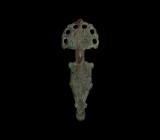 Visigothic Radiate Headed Brooch
Early 6th century AD. A bronze bow brooch comprising a D-shaped headplate with radiate openwork border and inset cab...