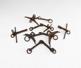 Medieval Horse Bridle Bit Collection
11th-14th century AD. A group of five iron snaffle bits, some with cheek-pieces and rings for attachment of rein...