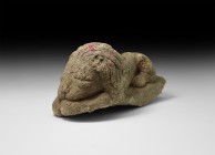 Medieval Resting Lion Statue
12th-14th century AD. A carved stone figure of a lion asleep with head resting on the forepaws, tail curled beneath the ...