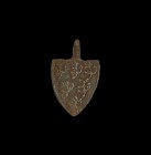 Medieval 'Willeame de Leiborne' Heraldic Horse Harness Pendant
13th century AD. A bronze heater-shaped harness pendant with pierced lug above, reserv...