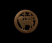 Medieval Agnus Dei Roundel
15th century AD. A bronze openwork roundel with concentric banded frame, central agnus dei motif with regardant nimbate la...