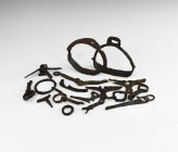 Medieval Stirrup and Other Artefact Group
11th-15th century AD. A mixed group of iron items including stirrups, bridle and harness fittings, prick sp...
