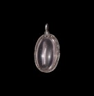 Medieval Silver and Rock Crystal Pendant with Inscription
12th-15th century AD or earlier. A keeled ovoid rock crystal pendant in a silver mount with...