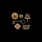 Medieval Artefact Group
12th-16th century AD. A mixed group comprising: a bronze casket key with voided lozenge bow; a bronze mount fragment with poi...