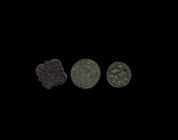 Medieval Seal Matrix Group
13th-15th century AD. A mixed group of bronze seals comprising: one discoid with image of a walled town, legend abraded; o...