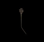Medieval Cage-Headed Pin
15th century AD. A large bronze hair or clothing pin with tapering shaft, angled to the lower portion; openwork head with di...