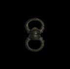 Anglo-Norman Hunting Dog Leash Swivel
11th-12th century AD. A swivel-mount with rings, each loop formed as a pair of opposed zoomorphic heads clutchi...