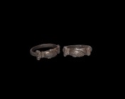 Post Medieval Silver Fede Ring with Clasped Hands
17th-18th century AD. A silver ring with D-section hoop, the bezel formed as two clasped hands with...
