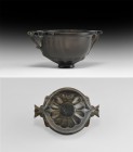 Roman Grand Tour Obsidian Skyphos
18th-19th century AD. A carved obsidian skyphos with wide rim, two small handles with carved leaf below, small foot...