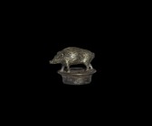 Post Medieval Silver Boar Statuette
18th century AD. A silver figurine of a boar advancing on a circular base, incised bristle detailing to the body,...