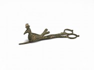 Post Medieval Bird Scissor Mould
19th century AD. A pair of bronze scissors with loop handles, large hollow crested bird to both arms, decorated with...
