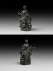 Tudor Statuette of a Scholar
16th century AD. A substantial bronze figure seated on a curule chair; the long hair tied at the back, long draped robes...