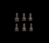 Post Medieval Gaming Piece Group
17th-18th century AD. A group of six tinned bronze gaming pieces with large base, bulbous body, knop finial with lar...