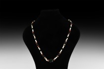 Post Medieval Mixed Bead Necklace
20th century AD or earlier. A restrung necklace composed of barrel-shaped white onyx beads, interspersed with spher...