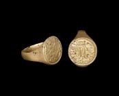 Post Medieval Signet Ring with Monogram
18th-early 19th century AD. A flat-section bronze hoop with expanding shoulders, discoid bezel with incised b...