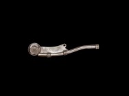 Post Medieval Silver Bosun's Whistle with Arrow Mark
19th-20th century AD. A silver bosun's whistle with cranked narrow pipe, flange to the underside...