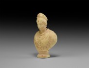 Roman Grand Tour Marble Bust
18th-19th century AD. A carved marble bust of a wealthy female with diadem and chignon to her hair, twisted collar and d...