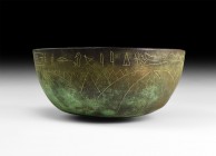 Grand Tour Bowl with Hieroglyphs
18th-19th century AD. A bronze hemispherical bowl with frieze of papyrus stalks and lotus blooms, hieroglyphic inscr...