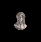 Post Medieval Silver Male Head Mount
16th-17th century AD. A silver applique fitting in the form of the bust of Bacchus, long hair falling to the sho...