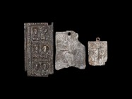 Post Medieval Plaque with Saints Group
18th-19th century AD. A mixed group of plaque fragments comprising: a rectangular bronze plaque with three reg...