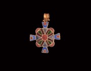 Post Medieval Gold and Enamel Cross Pendant
19th-20th century AD. A gold cruciform pendant with gusseted suspension loop on a hinge, discoid plaque w...