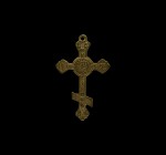 Post Medieval Cross Pendant
19th-20th century AD. A bronze Russian Orthodox cross pendant with integral suspension loop, raised central plaque with '...
