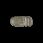North American Polished Axehead
1st millennium AD. A polished limestone axehead with broad curved edge, recessed grip to the rear, gently rounded but...