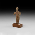 Pre-Columbian Colima Figurine
100 BC-250 AD. A terracotta figurine of a standing nude female with applied facial details, headdress, earrings, hair, ...